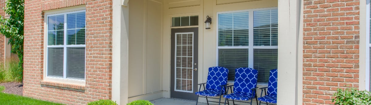 Patio seating in Greenwood apartments